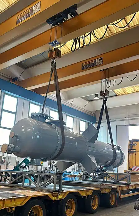 industrial-heat-exchanger-being-lifted-in-workshop